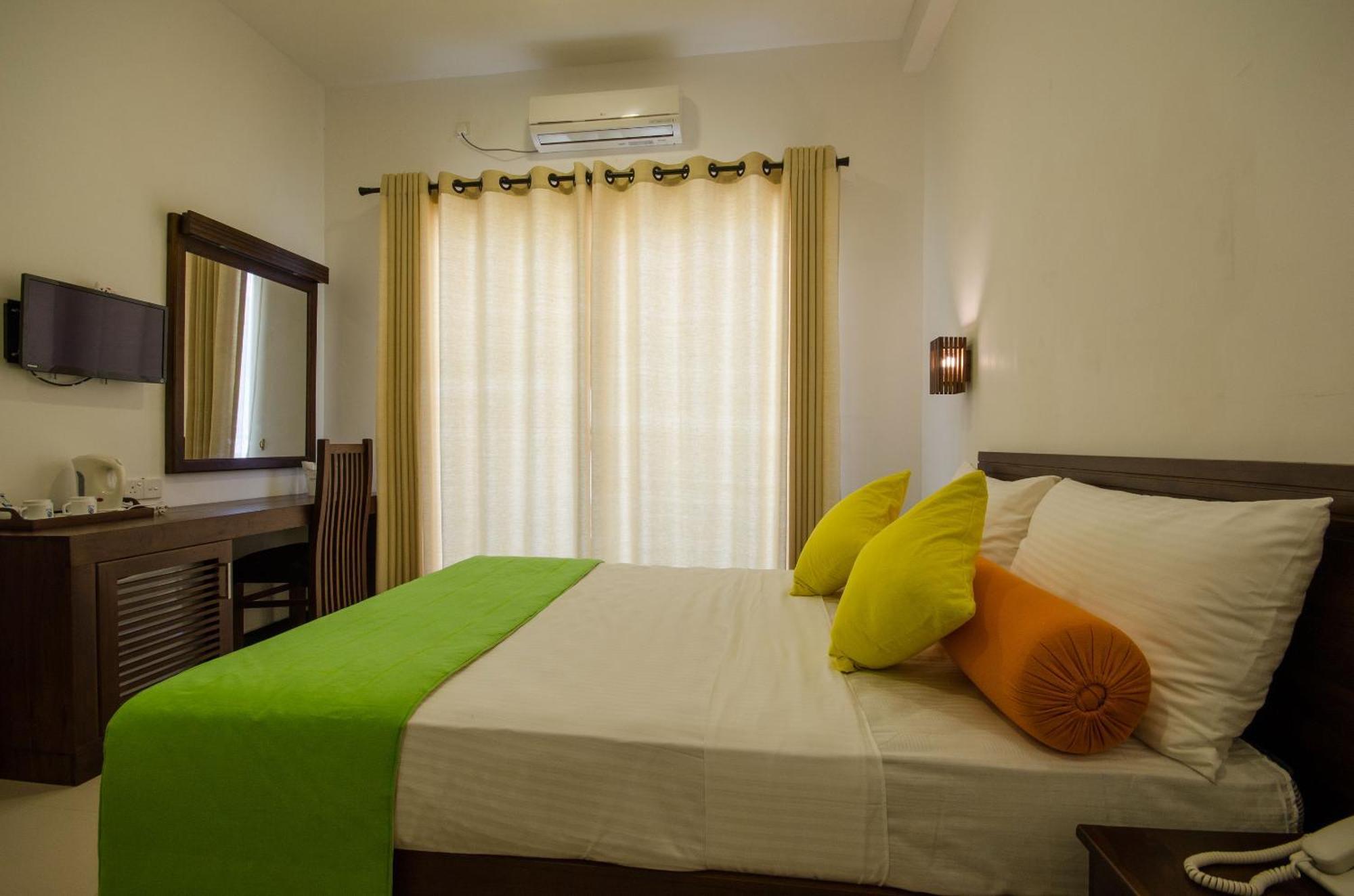 Okwin Resort Kandy Rum bild