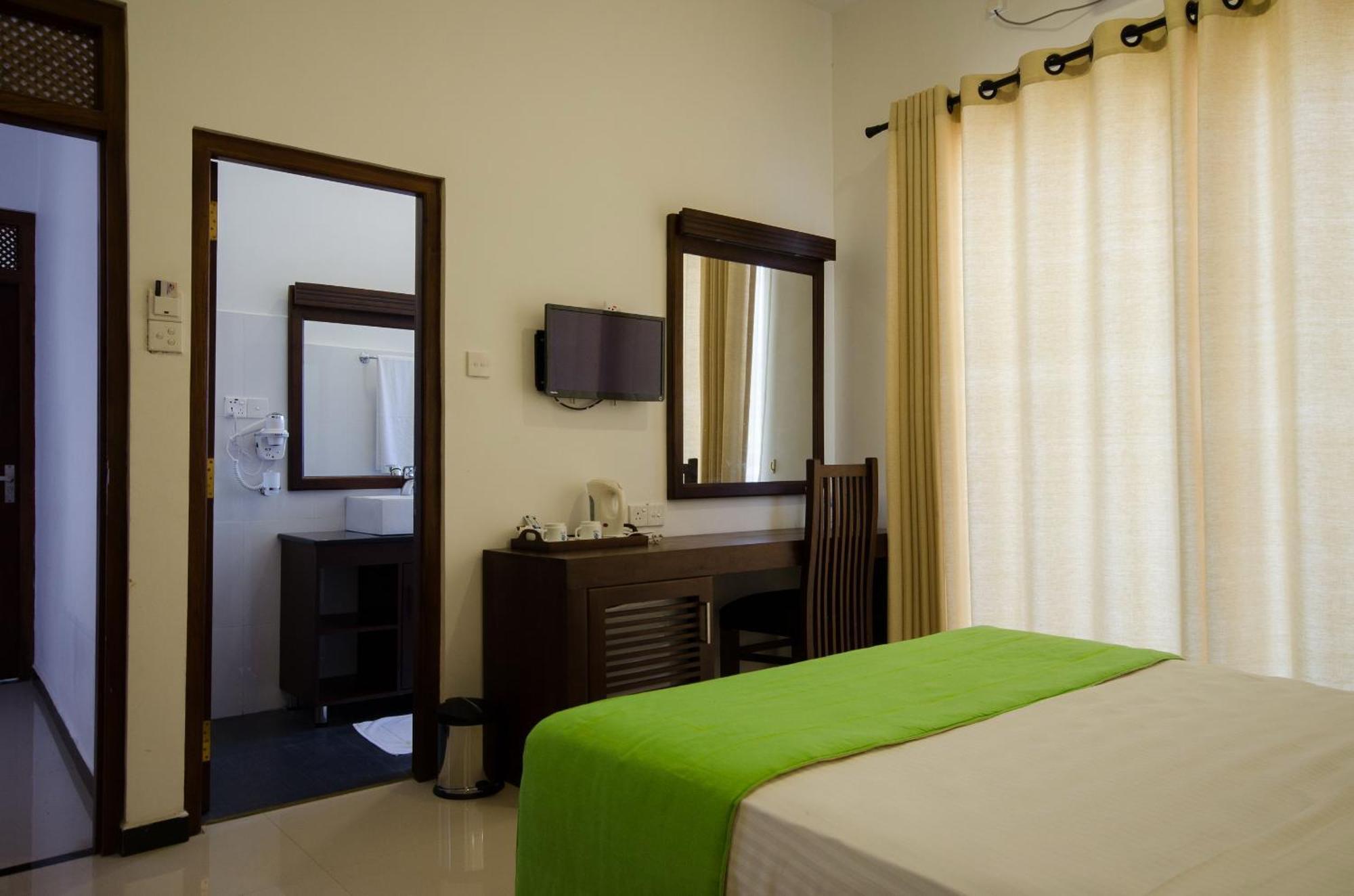 Okwin Resort Kandy Rum bild